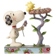 snoopy-offrand-une-fleur-a-woodstock-jim-shore