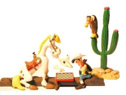 Lucky Luke jouant aux échecs avec Jolly Jumper