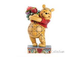 Winnie offre des fleurs