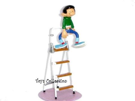 Gaston en haut de l'escabeau