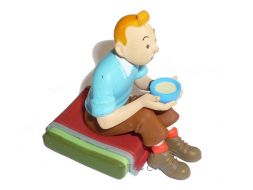 Tintin assis